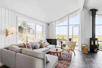 a living room with a couch and a table at BL1428-Saltum-Karen-Mariesvej-31-D in Saltum