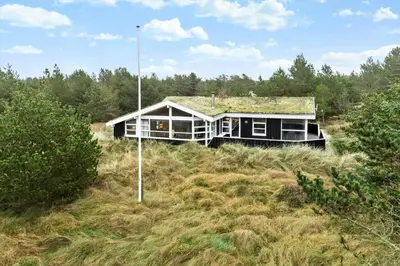 a house sitting on top of a hill in a field at BL295-Saltum-Graabakken-2 in Saltum