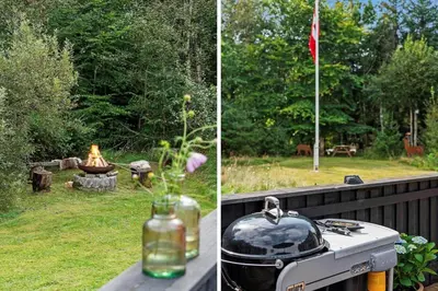 a grill and a pot on a table in a backyard at BL1338-Pandrup-Lunekrogen-10 in Pandrup