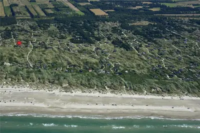 an aerial view of a beach and the ocean at BL980-Saltum-Faarup-Klitvej-46 in Saltum