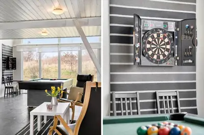 a dart board on the wall of a restaurant at BL106-Saltum-Tolhoj-2 in Saltum