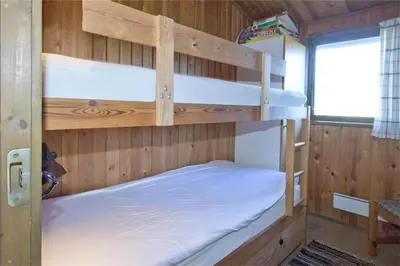 a bedroom with two bunk beds in a cabin at BL363-Saltum-Nyborgvej-4 in Saltum