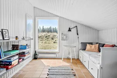 a white room with a bed and a window at BL112-Saltum-Kvansletten-20 in Saltum