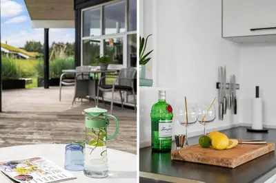 a kitchen with a table with a bottle of wine at BL127-Saltum-Laustvej-22 in Saltum
