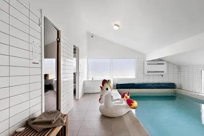 a swimming pool with a inflatable duck in the middle of it at BL714-Saltum-Ornebjergvej-24 in Saltum