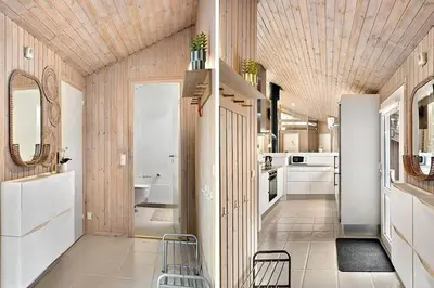 a kitchen with white appliances and a wooden ceiling at BL714-Saltum-Ornebjergvej-24 in Saltum