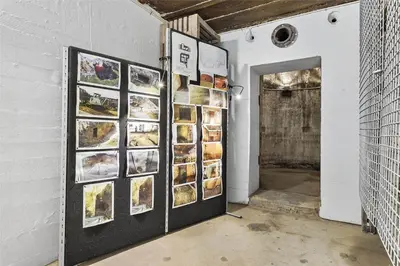 a display of pictures on a wall in a room at BL1540-Blokhus-Jens-Baerentsvej-14 in Blokhus