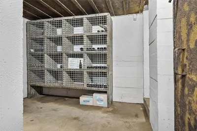 a room with a cage full of cats in it at BL1540-Blokhus-Jens-Baerentsvej-14 in Blokhus