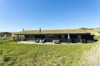a house on the side of a grassy field at BL188-Saltum-Kordalssletten-3 in Saltum