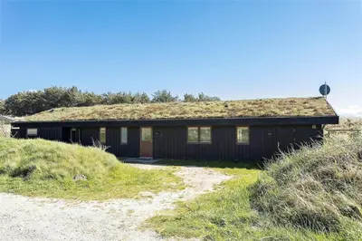 a house with a grass roof on top of it at BL188-Saltum-Kordalssletten-3 in Saltum
