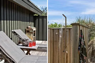 a deck with a bench and a wooden fence at BL1755-Saltum-Karen-Mariesvej-57 in Saltum
