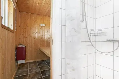 a bathroom with a shower and a walk in shower at BL216-Saltum-Svendborgvej-25 in Saltum