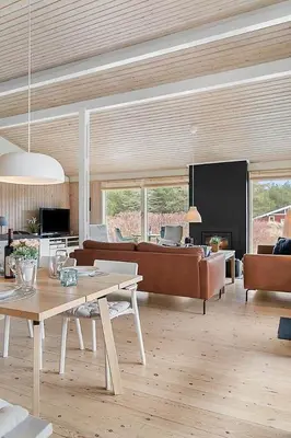 a living room with a couch and a table at BL103-Saltum-Daadyrvej-23-A in Saltum