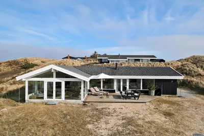 a house on top of a hill with a patio at BL1530-Saltum-Kohlsvej-7 in Saltum