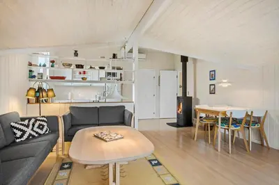 a living room with a couch and a table at BL1558-Saltum-Opossumvej-20 in Saltum