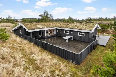 a black tiny house with a grass roof at BL1263-Saltum-Ornebjergvej-25 in Saltum