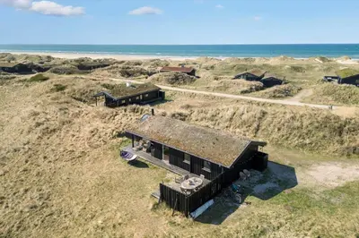 an aerial view of a house on the beach at BL1529-Pandrup-Ferborgvej-58 in Pandrup