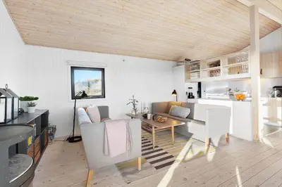 a living room with a couch and a table at BL1529-Pandrup-Ferborgvej-58 in Pandrup