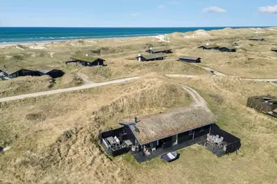 an overhead view of a house with a grass roof at BL1529-Pandrup-Ferborgvej-58 in Pandrup