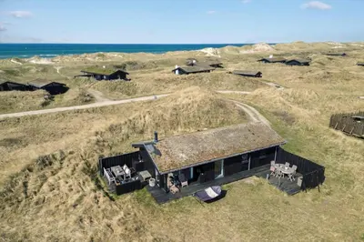 an overhead view of a house with a grass roof at BL1529-Pandrup-Ferborgvej-58 in Pandrup
