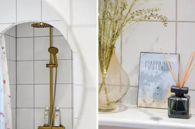 a bathroom with a vase and a shower in a room at BL1246-Blokhus-Vigen-6 in Blokhus