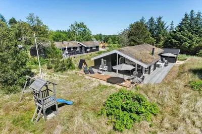an aerial view of a house on a hill at BL1700-Blokhus-Bloksbjerg-55 in Blokhus