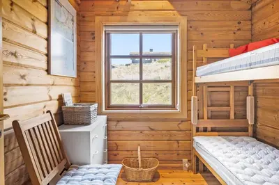 a room with two bunk beds and a window at BL1801-Saltum-Kordalsvej-115 in Saltum