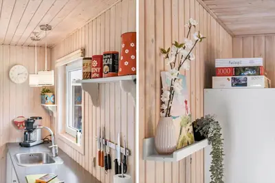a kitchen with a sink and a refrigerator at BL1332-Pandrup-Rodhusparken-78 in Pandrup