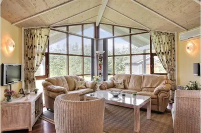 a living room with couches and a table at BL861-Blokhus-Pirupshvarrevej-49 in Blokhus