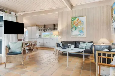 a living room with a couch and a table at BL203-Saltum-Karen-Mariesvej-67 in Saltum