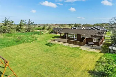 an aerial view of a house with a large yard at BL1715-Saltum-Kvansletten-15 in Saltum