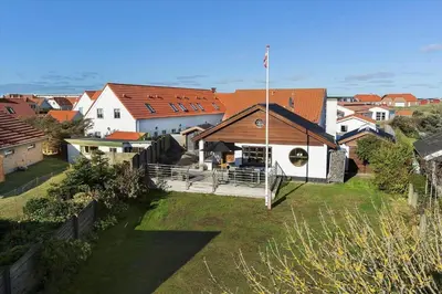 an aerial view of a house in a village at BL1527-Blokhus-Svinget-5 in Blokhus