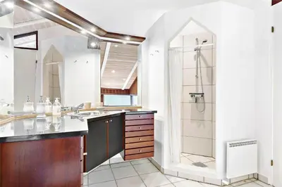 a bathroom with a shower and a sink at BL236-Blokhus-Pirupshvarrevej-27 in Blokhus