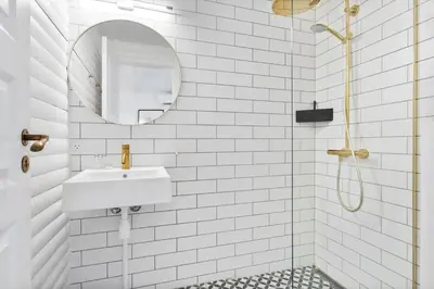 a white bathroom with a sink and a mirror at BL1314-Pandrup-Nordvej-11 in Pandrup