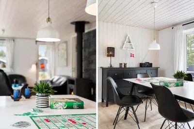 a kitchen and a living room with a table and chairs at BL1286-Saltum-Lyngsletten-4 in Saltum