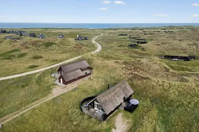 an overhead view of a small house in a field at BL830-Pandrup-Bardehvalen-3 in Pandrup