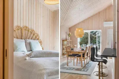 a bedroom and a dining room with a bed and a table at BL1328-Saltum-Kvanbaekvej-33 in Saltum