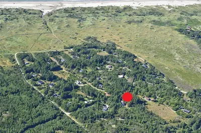an aerial view of a forest with a red circle at BL1384-Blokhus-Kragebak-7 in Blokhus