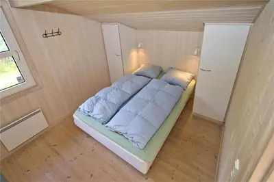 a bedroom with a bed in a small room at BL178-Saltum-Ornebjergvej-16 in Saltum