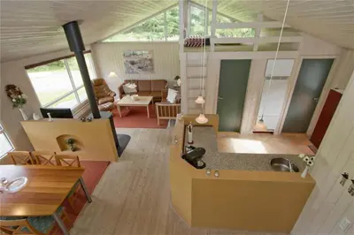 a view of a kitchen and living room in a tiny house at BL178-Saltum-Ornebjergvej-16 in Saltum