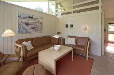 a living room with a couch and a coffee table at BL178-Saltum-Ornebjergvej-16 in Saltum