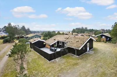 an aerial view of a house with a roof at BL1029-Pandrup-Rodhus-Skolevej-9 in Pandrup