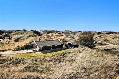 an aerial view of a house on a hill at BL244-Blokhus-Moreavej-17 in Blokhus