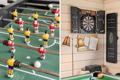 a room with a dart board and toy men playing darts at BL842-Blokhus-Laerkevej-29 in Blokhus