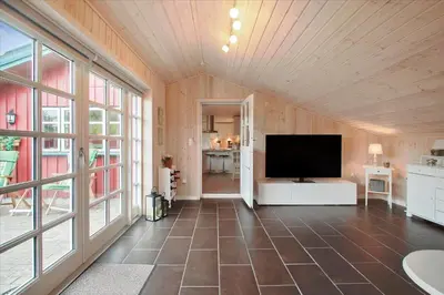 a large living room with a flat screen tv at BL1743-Pandrup-Rodhus-Skolevej-14 in Pandrup