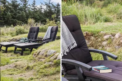 a couple of chairs sitting in the grass at BL1471-Blokhus-Solbakkevej-15 in Blokhus