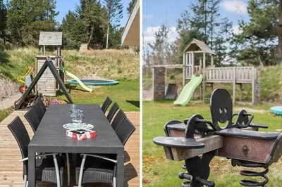 a picnic table and a playground with a slide at BL1639-Blokhus-Bloksbjerg-57 in Blokhus
