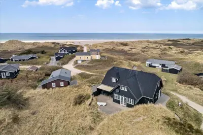 an aerial view of a group of houses on the beach at BL854-Saltum-Porsevej-6-A in Saltum