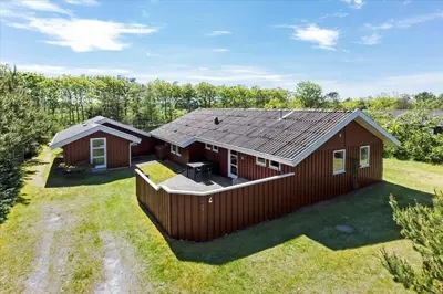 a large red house with a yard at BL410-Saltum-Store-Fiskerbanke-4 in Saltum