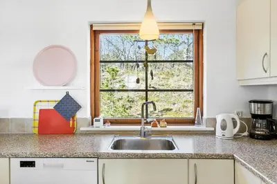 a kitchen with a sink and a window at BL245-Pandrup-Bremersvej-4 in Pandrup